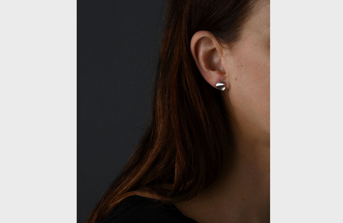 Woman Wearing Sterling Silver Studs