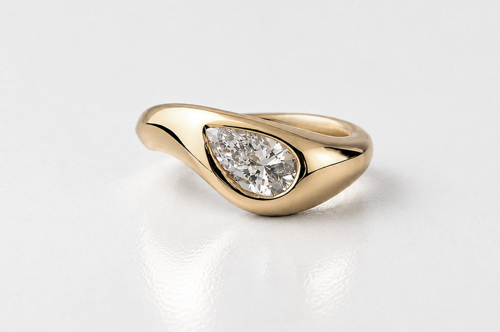 PEAR DIAMOND SOLITAIRE | YELLOW GOLD