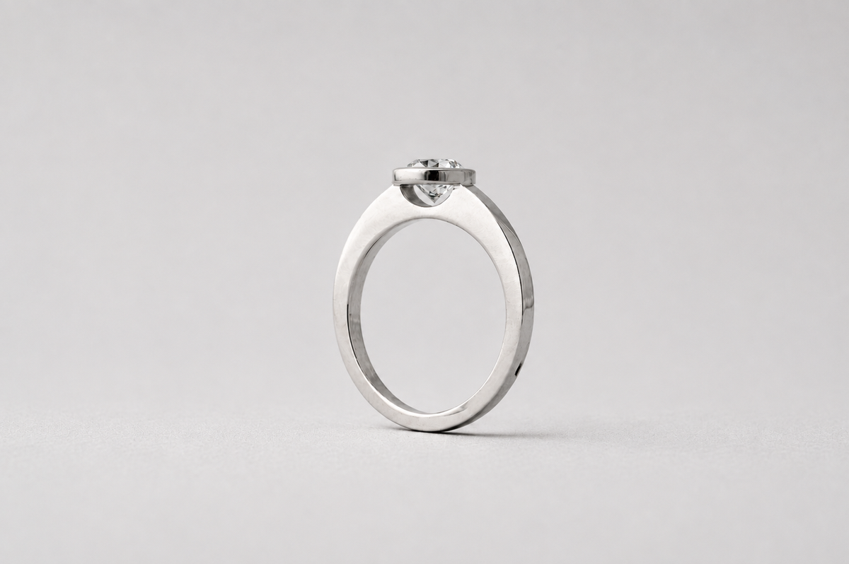 BEZEL SET DIAMOND SOLITAIRE RING | 19K WHITE GOLD